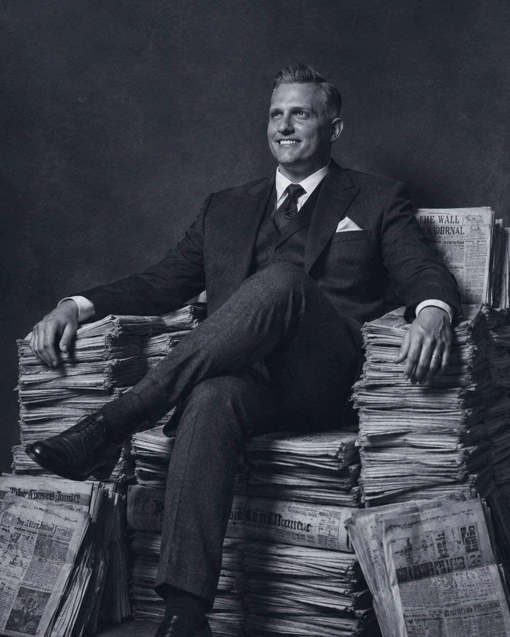 Shane Pierson, seated in a dark suit